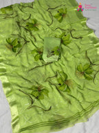 close up detailing of green chiffon resham embroidery saree