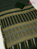 border detail of green chiffon saree