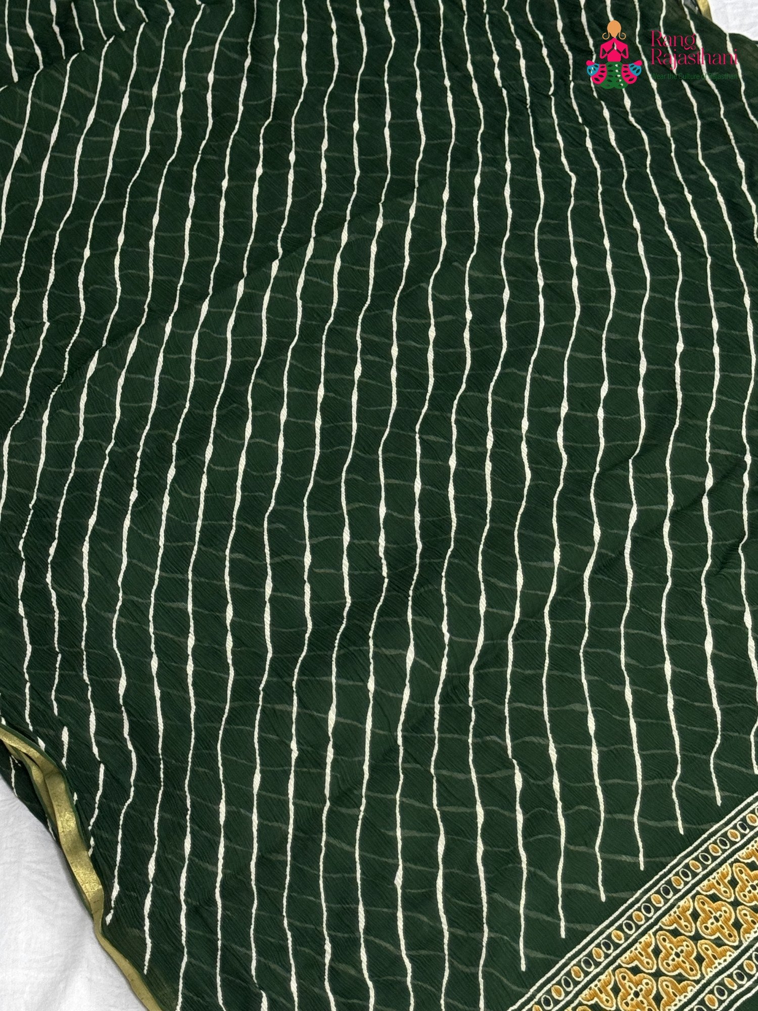 design pattern of green chiffon saree