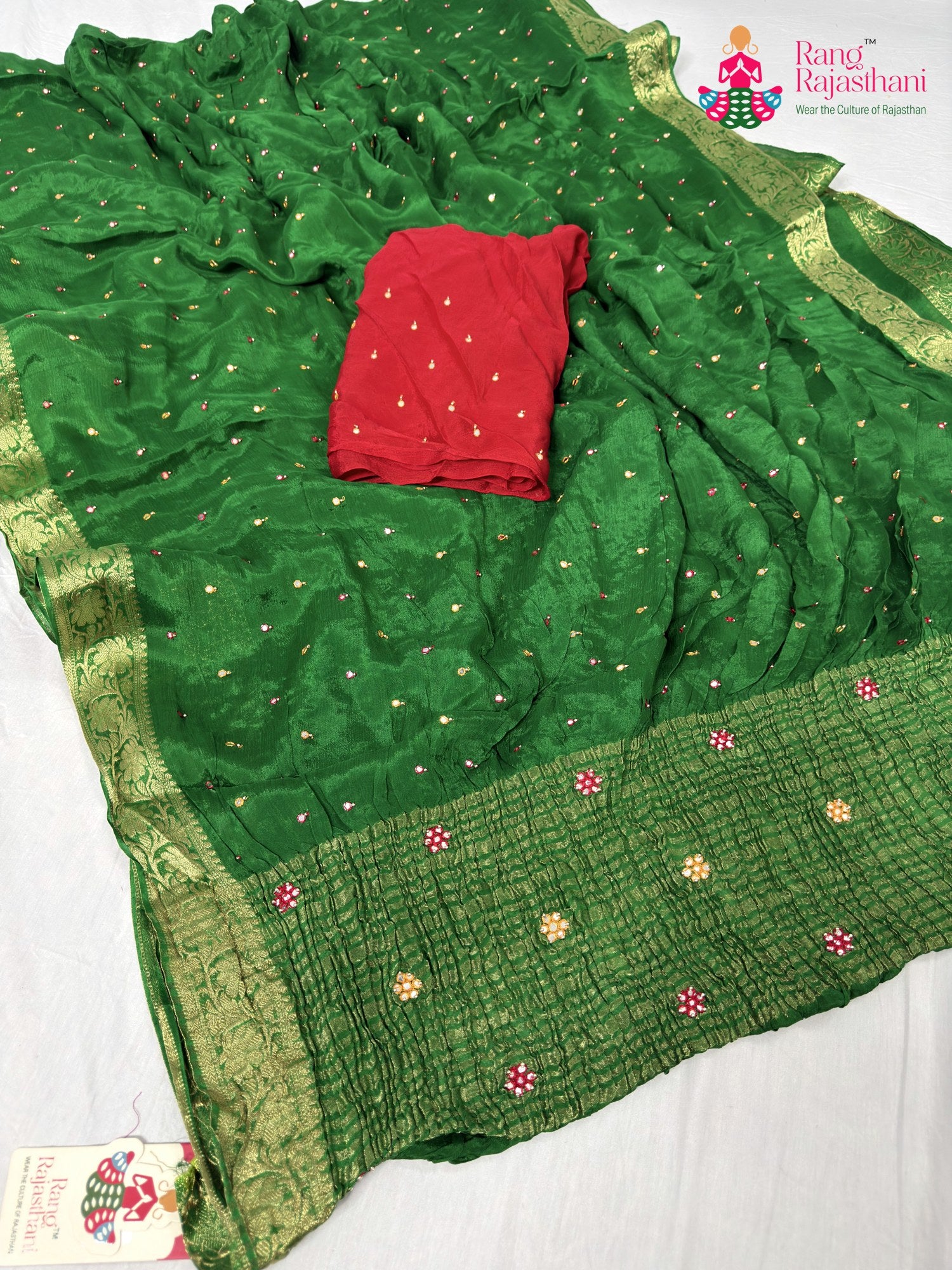 close up detailing of green chinnon banarasi zari weave saree