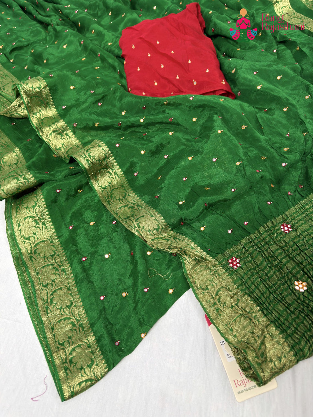 border detailing of green chinnon banarasi zari weave saree