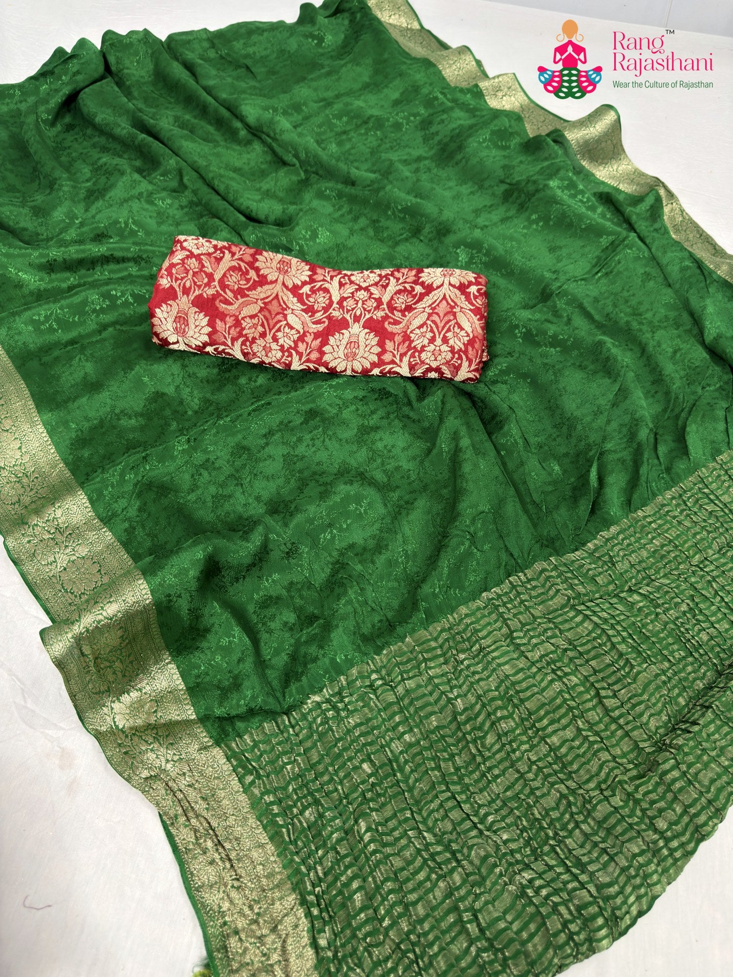 close up detailing of green chinnon jacquard weave saree