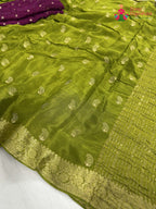 pallu detailing of green chinnon resham embroidery saree