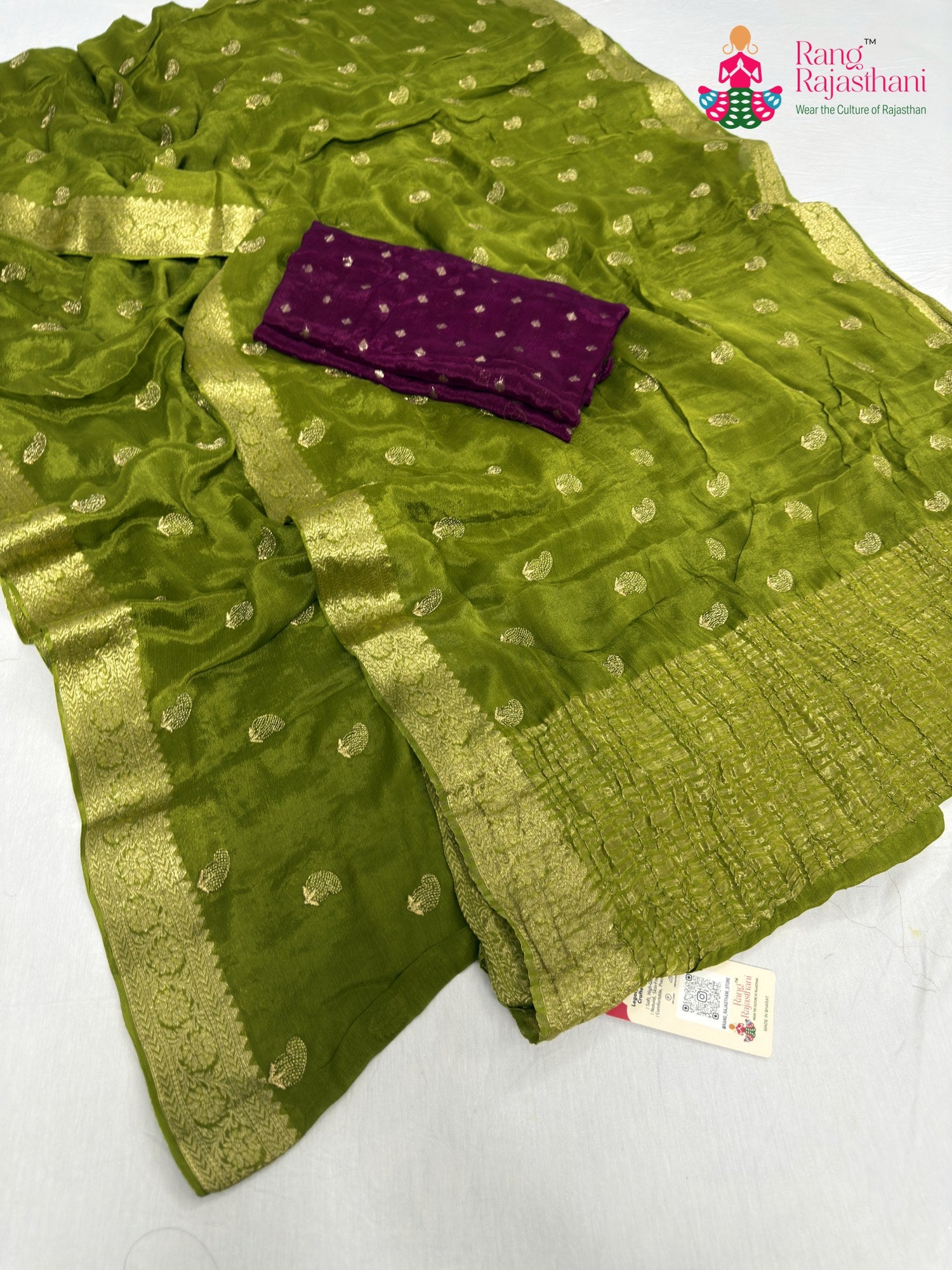 close up detailing of green chinnon resham embroidery saree