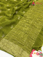pallu detailing of green chinnon resham embroidery saree