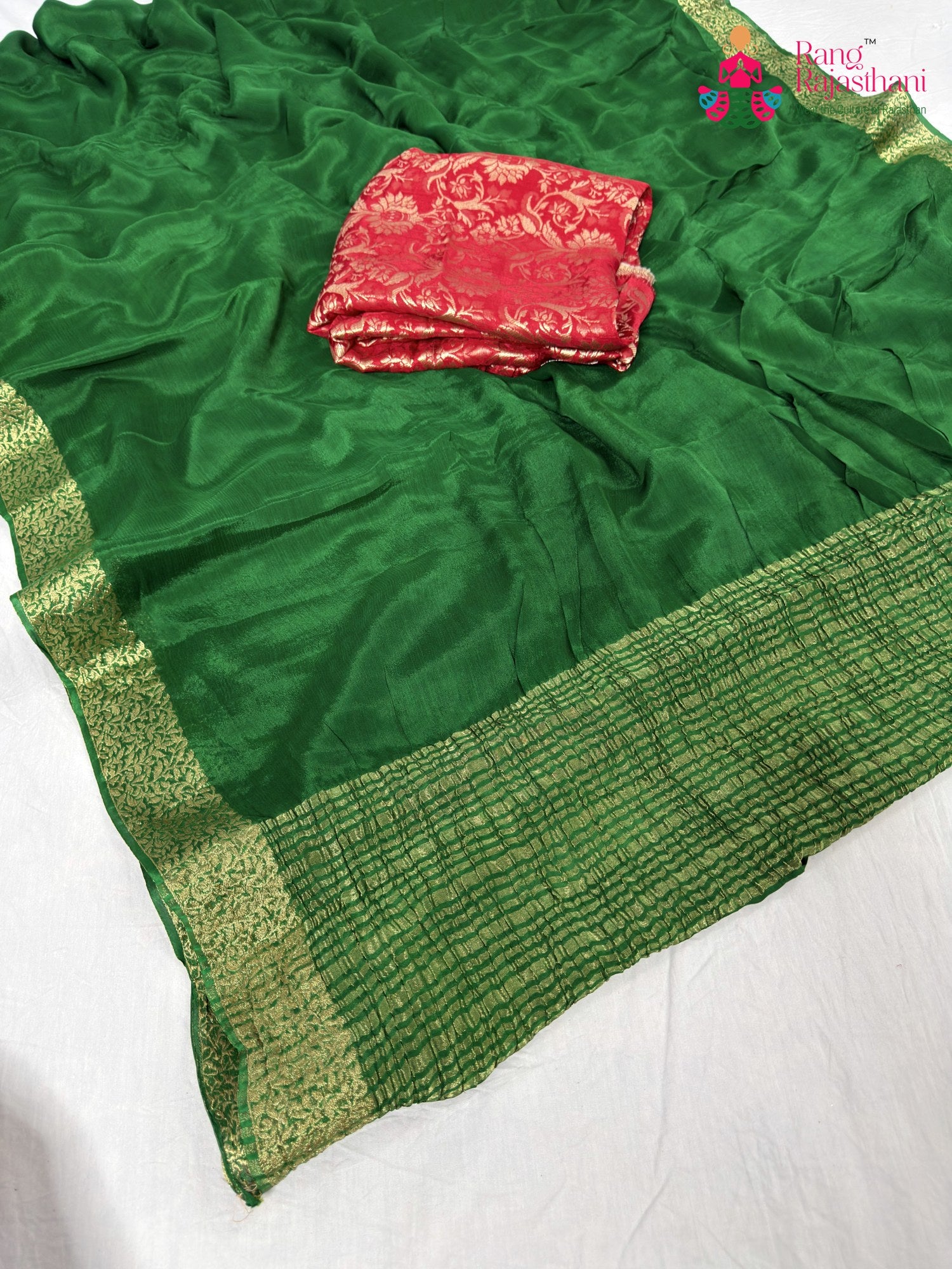 close up detailing of green chinnon saree
