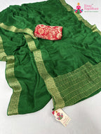 border detailing of green chinnon saree