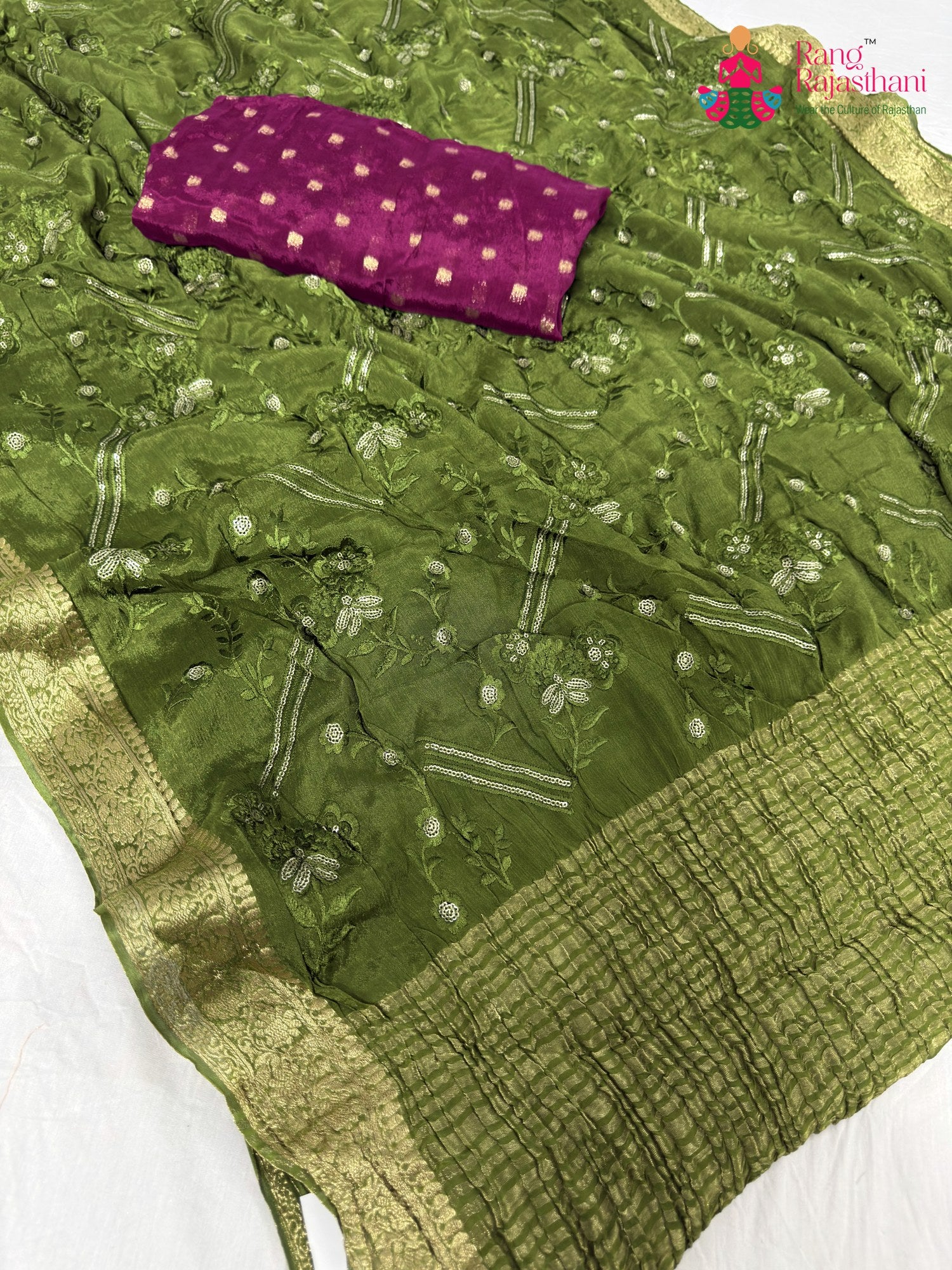 pallu detailing of green chinnon sequin saree