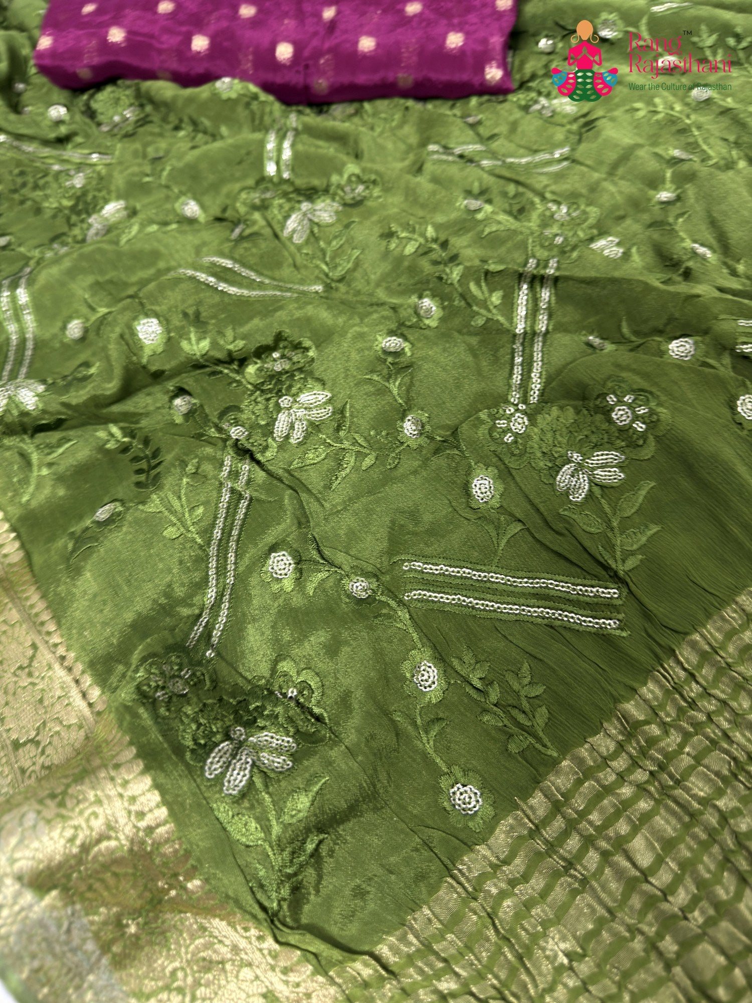 close up detailing of green chinnon sequin saree