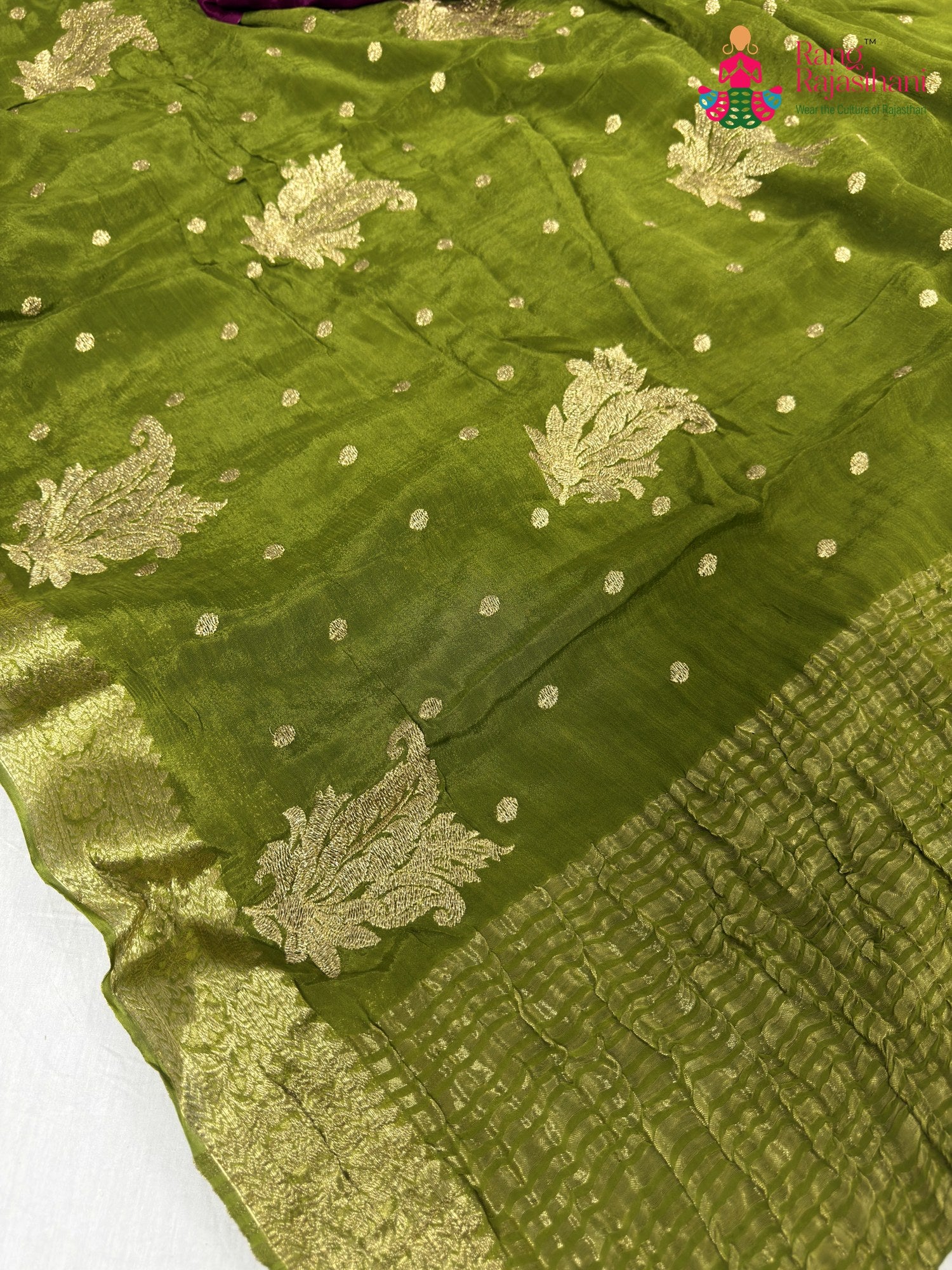 pallu detailing of green chinnon sequin saree