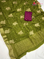 pallu detailing of green chinnon sequin saree