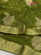 close up view of green chinnon sequin saree