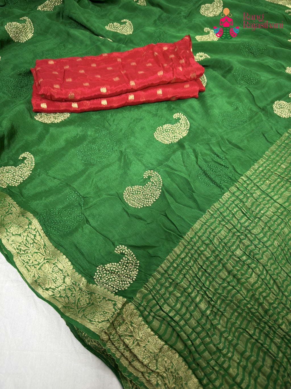 pallu detailing of green chinnon zari embroidery saree