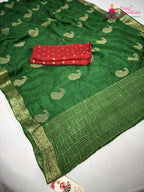 close up detailing of green chinnon zari embroidery saree