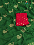 border detail of green chinnon zari embroidery saree