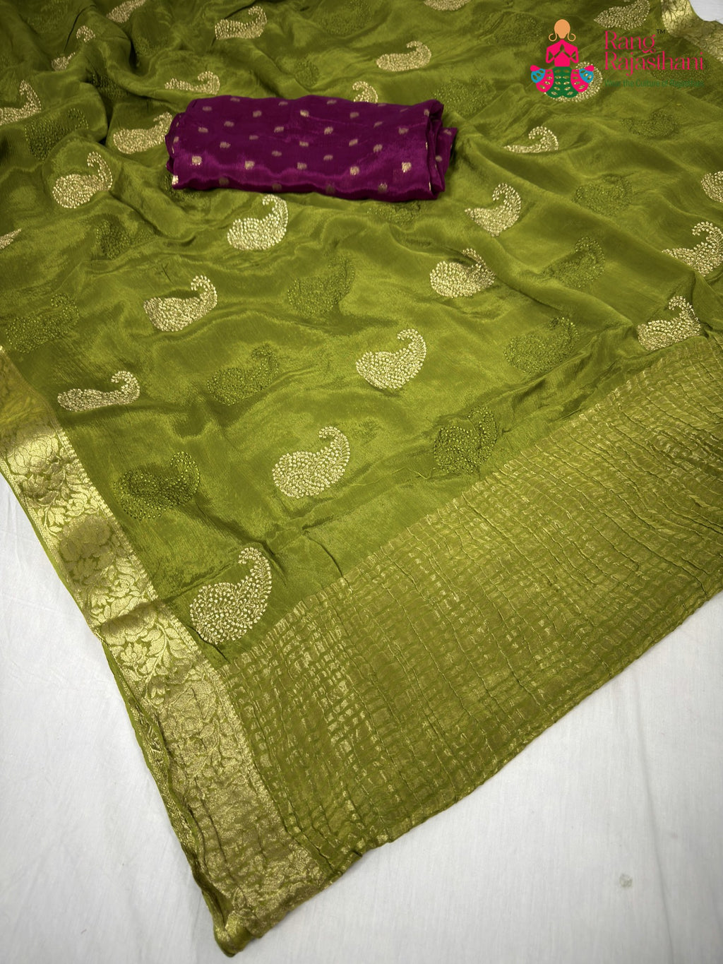 pallu detailing of green chinnon zari embroidery saree