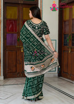 Dark Green Soft Synthetic Silk saree with Zari Work and Figure Work back view