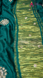 border detail of green modal sequin saree