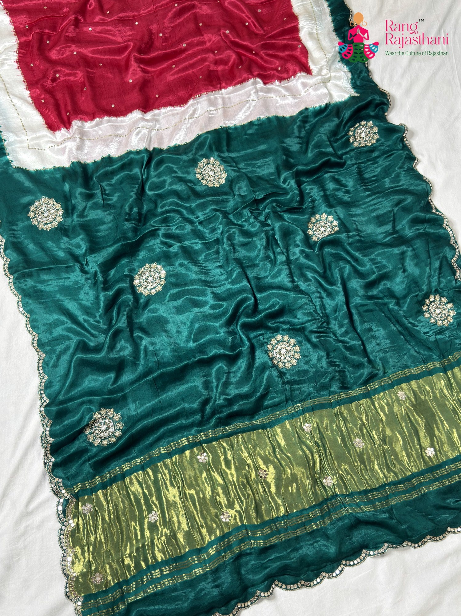 color and weave of green modal sequin saree