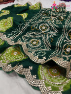 pallu detailing of green pure gajji silk gota patti saree 