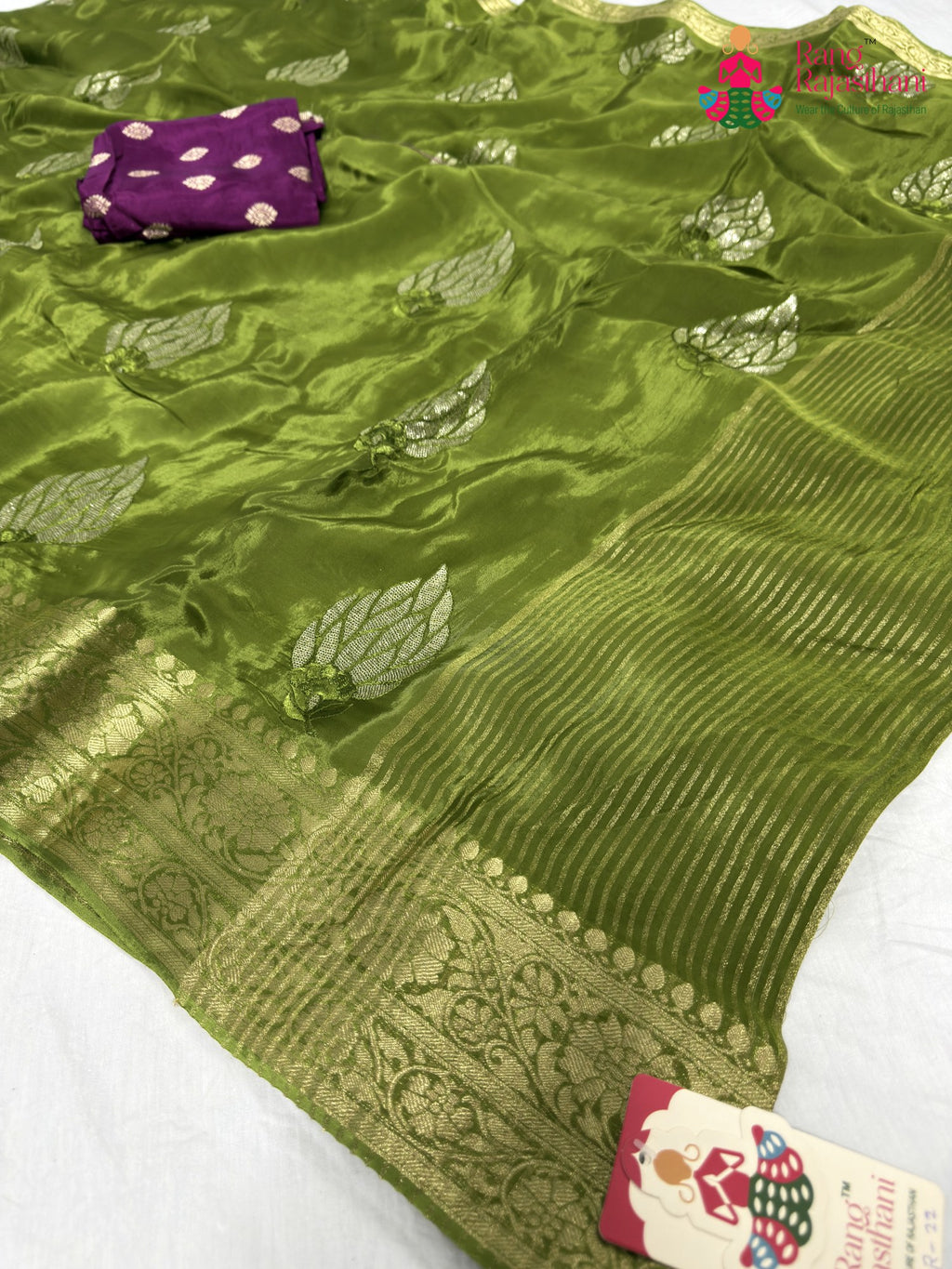 close up detailing of green pure ho silk sequin saree