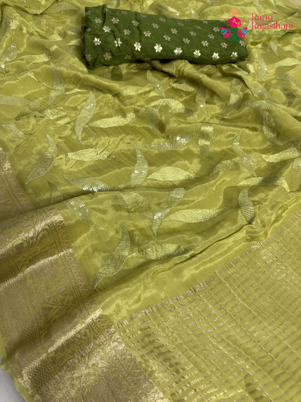 pallu detailing of green pure ho silk sequin saree