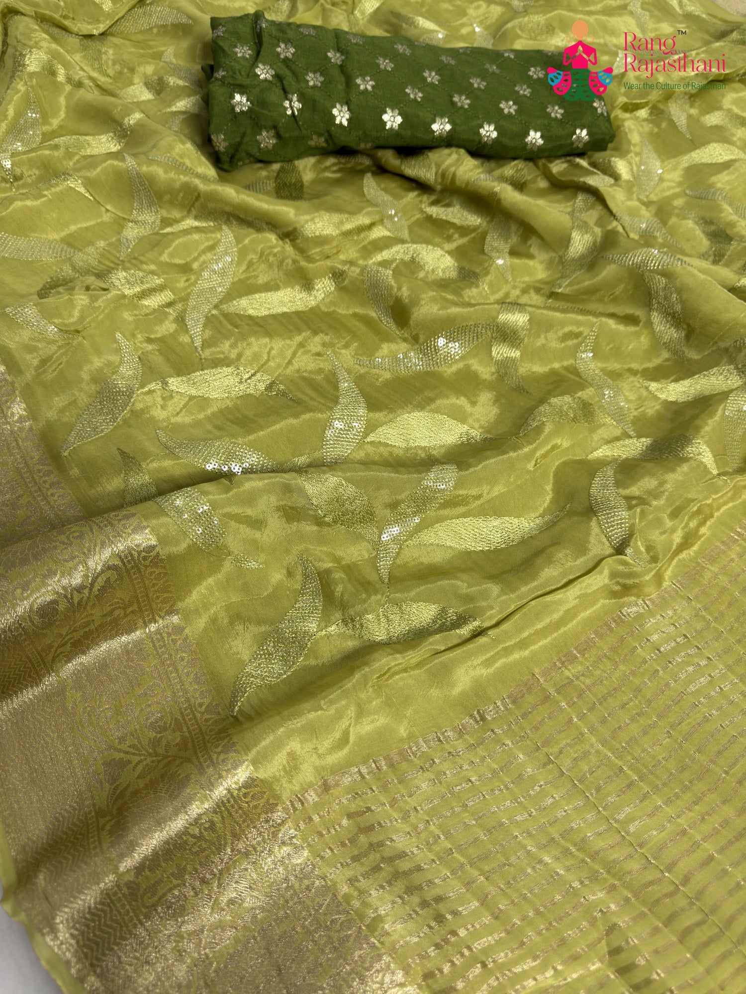 pallu detailing of green pure ho silk sequin saree