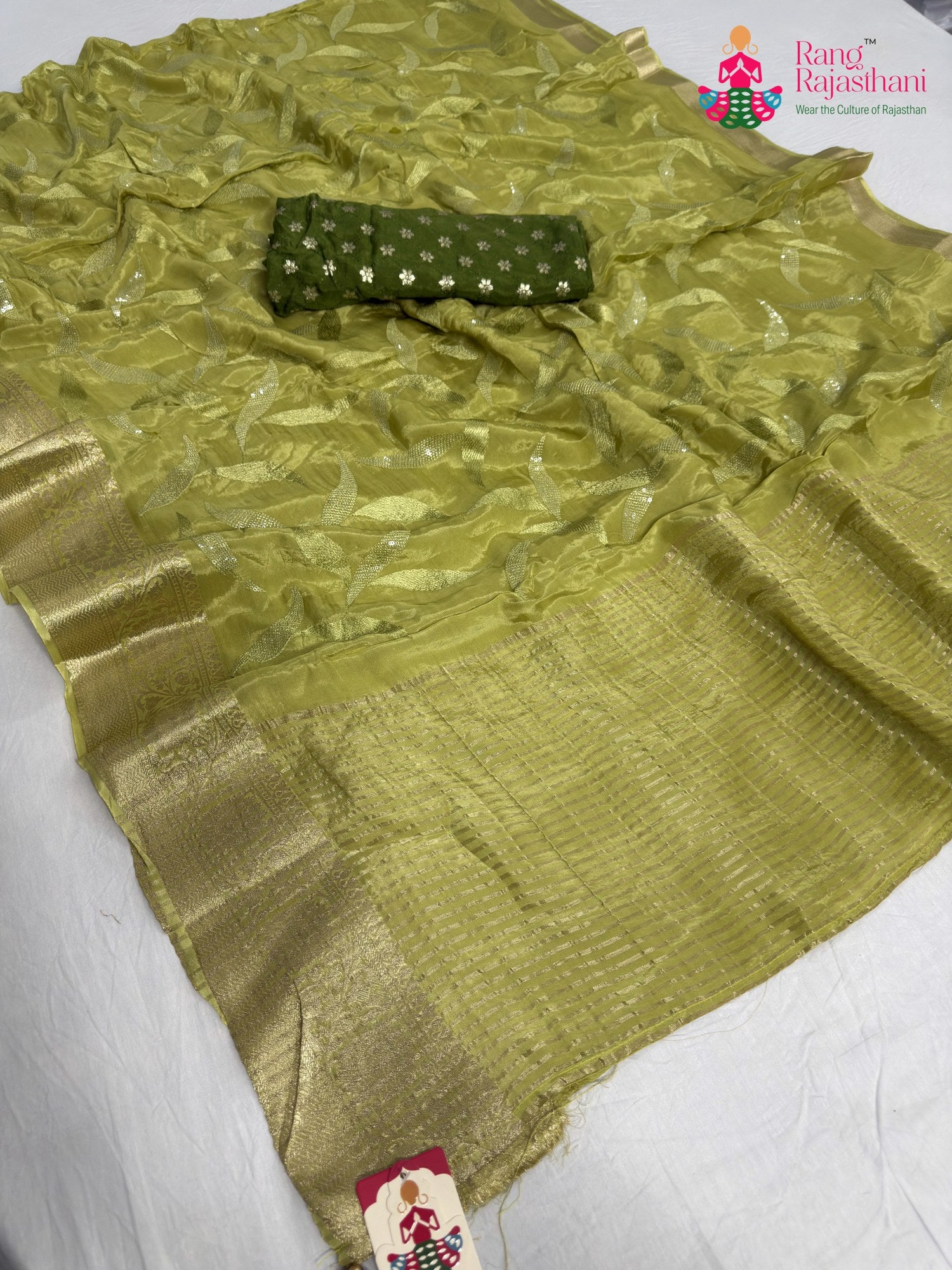 complete look of green pure ho silk sequin saree