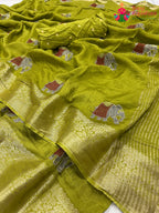 close up detailing of green pure Russian silk resham embroidery saree 