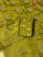 pallu detailing of green pure silk zari embroidery saree