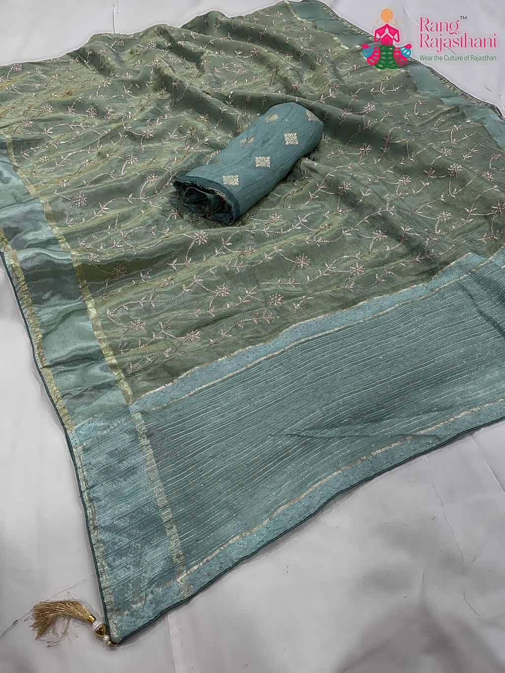 pallu detailing of green pure tissue silk zari embroidery saree 