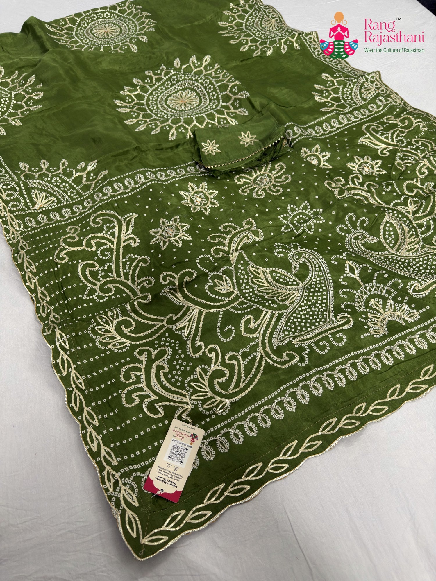 green pure upada silk bandhani saree for mehendi ceremony by Rang Rajasthani