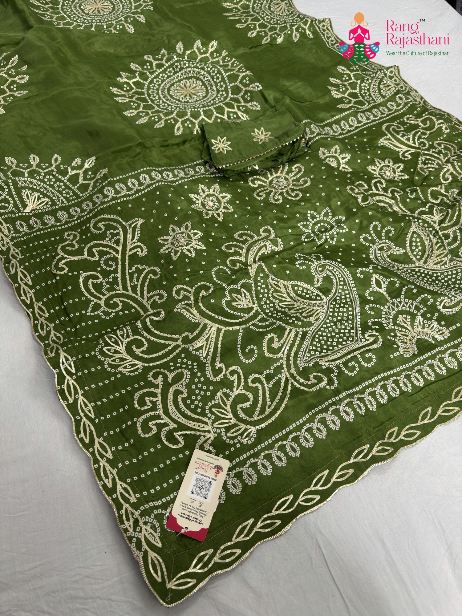 pallu detailing of green pure upada silk bandhani saree