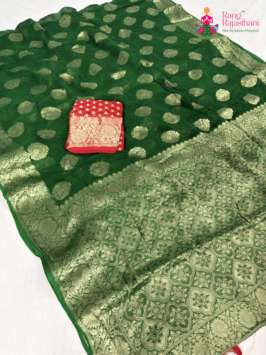pallu detailing of green soft georgette banarasi zari weave saree