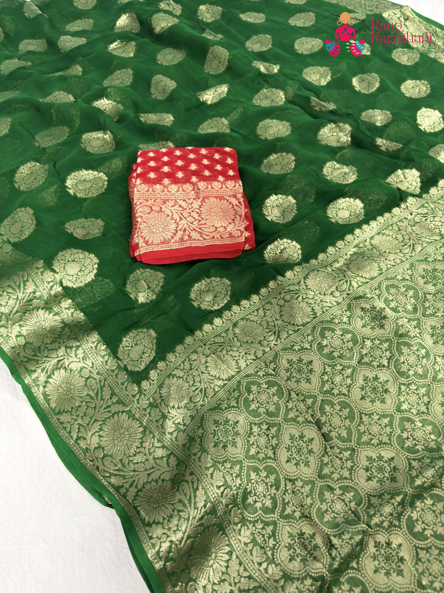 close up detailing of green soft georgette banarasi zari weave saree