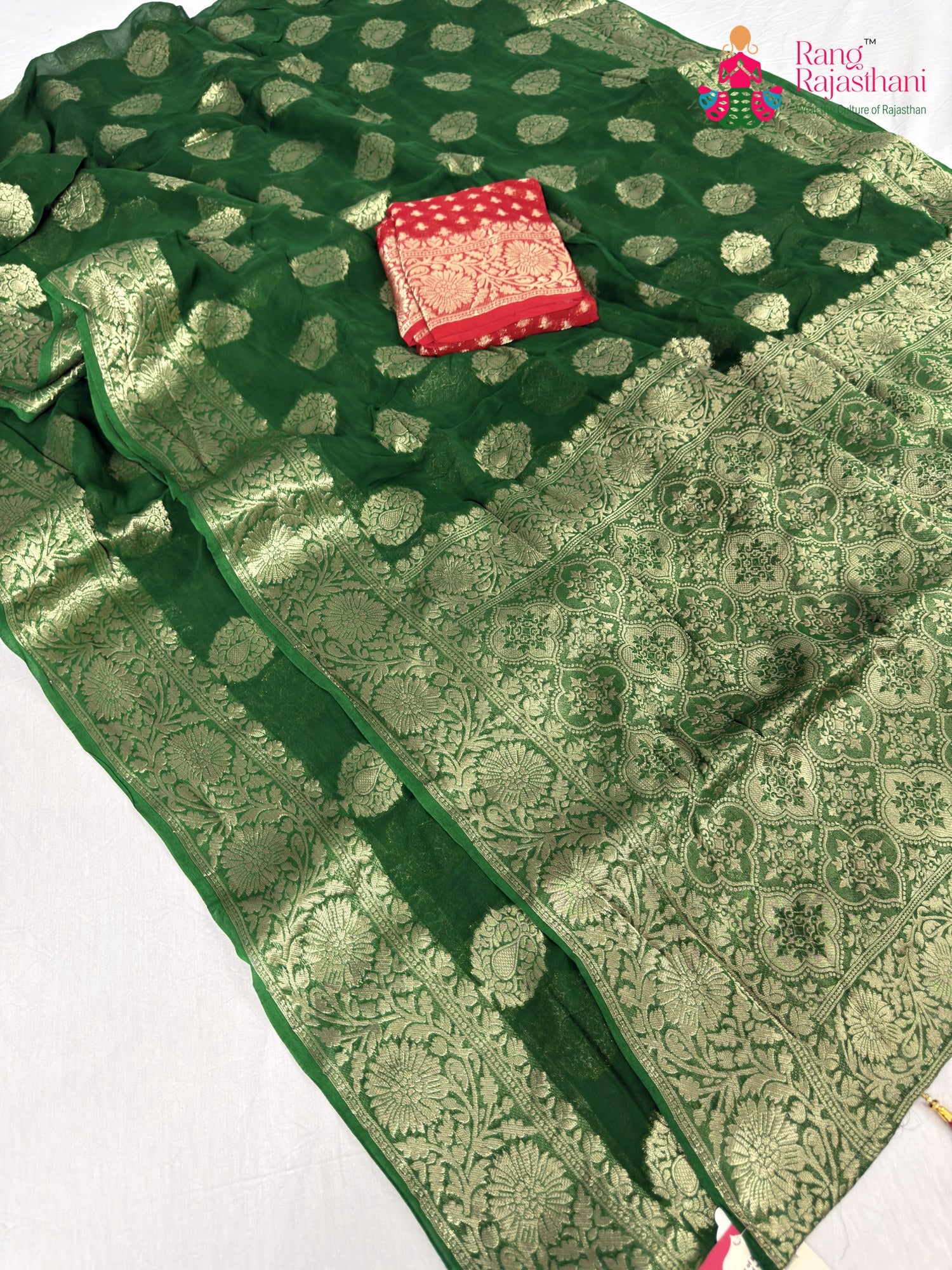 border detailing of green soft georgette banarasi zari weave saree
