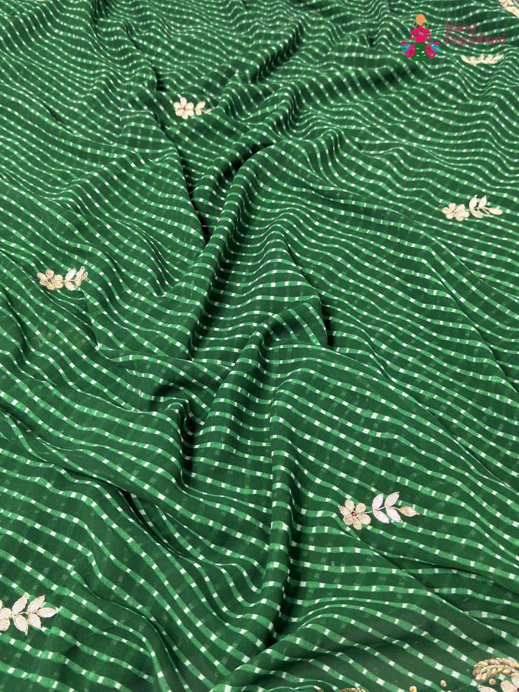 pallu detailing of green soft georgette gota patti saree