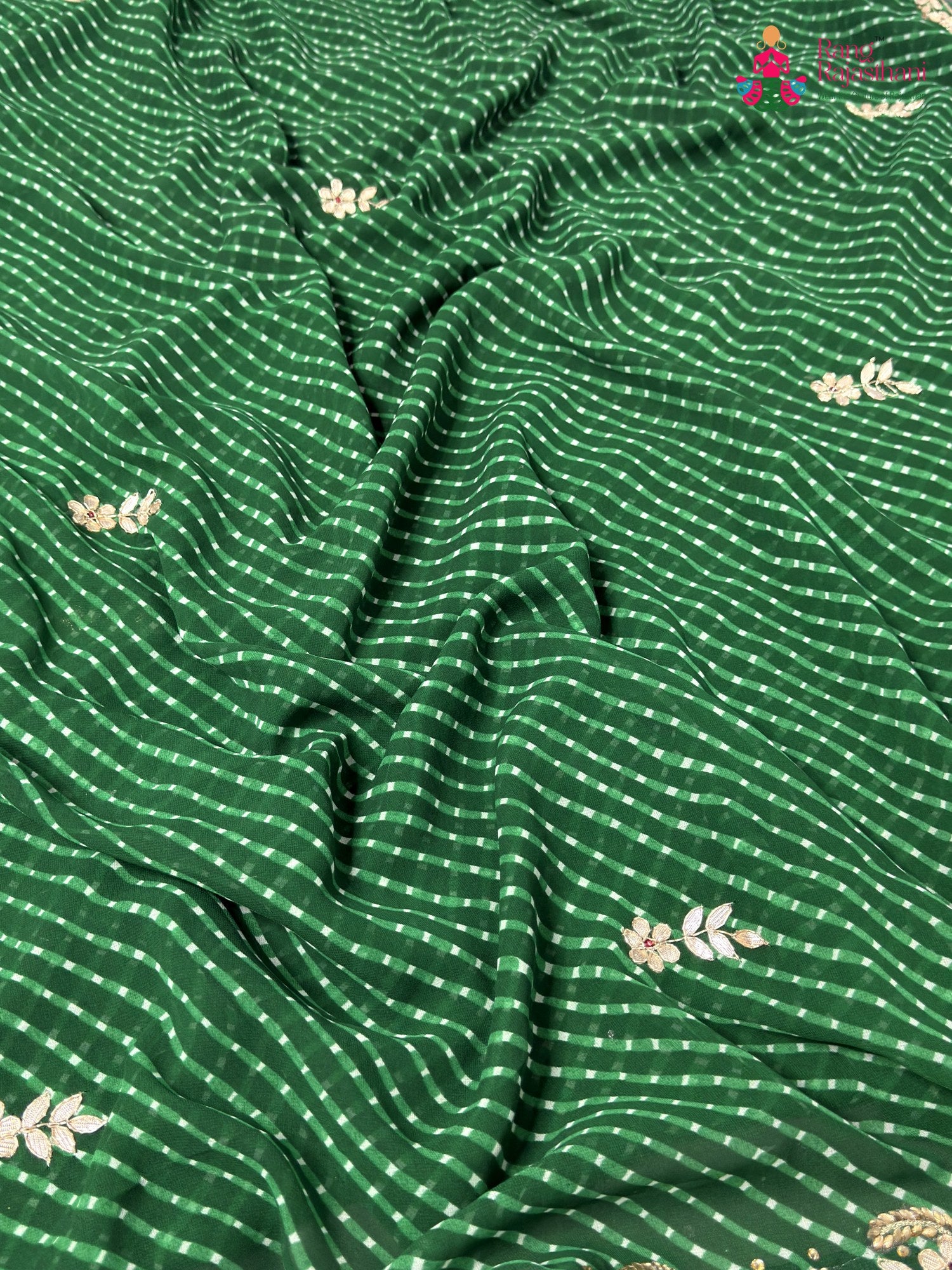 pallu detailing of green soft georgette gota patti saree