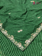 close up detailing of green soft georgette gota patti saree