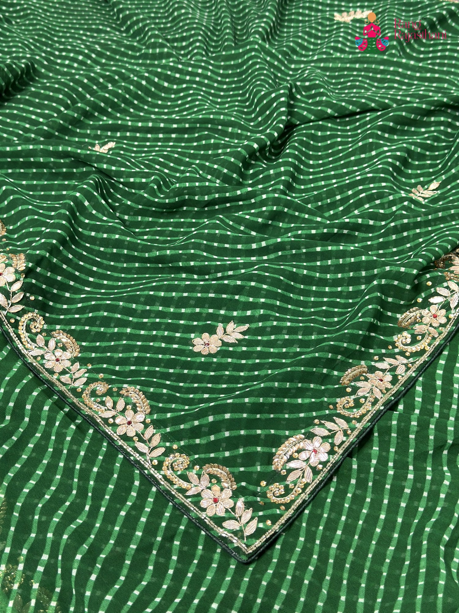 close up detailing of green soft georgette gota patti saree