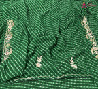 border detailing of green soft georgette gota patti saree
