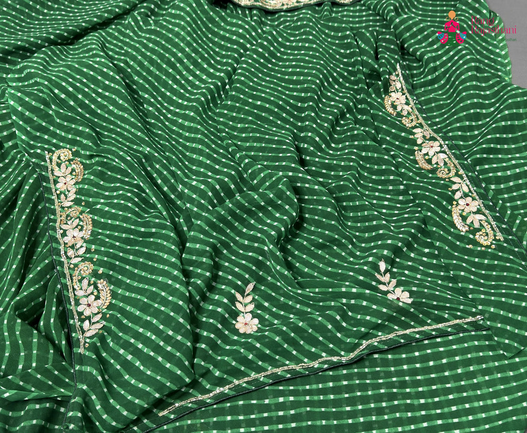 fabric texture of green soft georgette gota patti saree