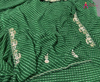 fabric texture of green soft georgette gota patti saree