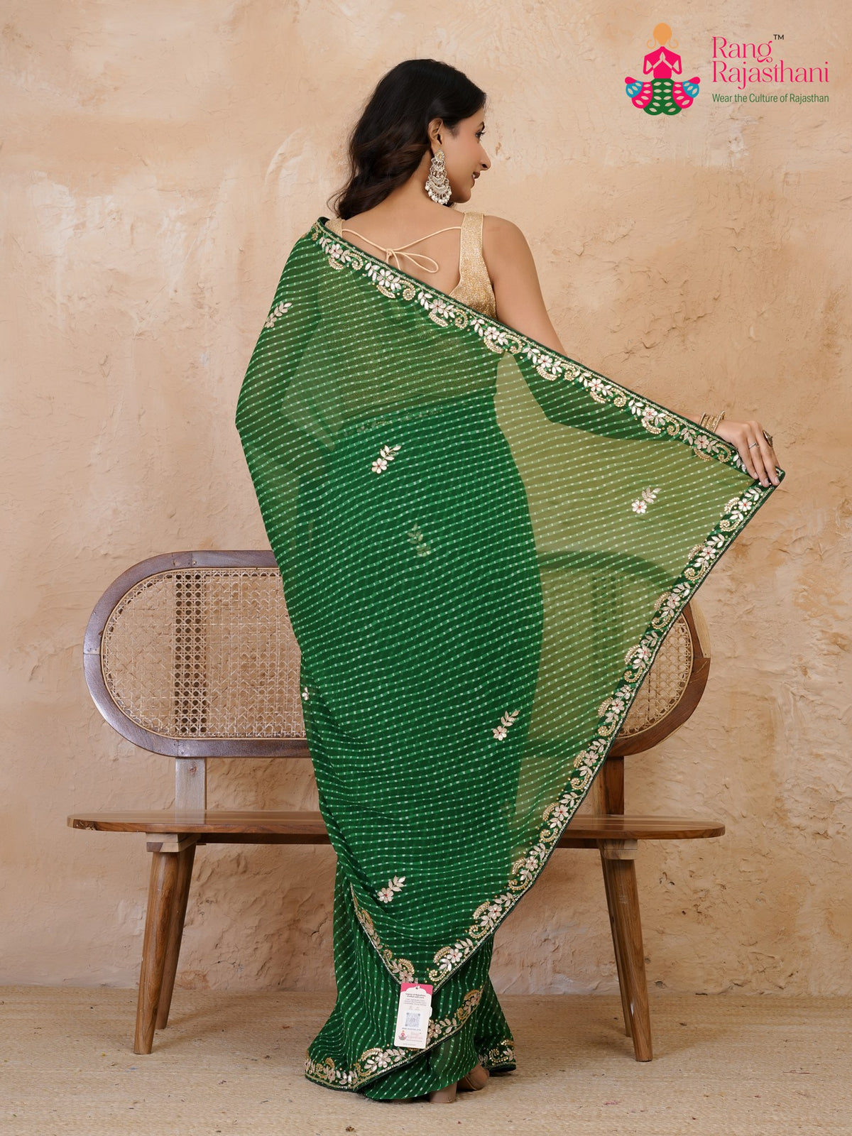 border detail of green soft georgette gota patti saree
