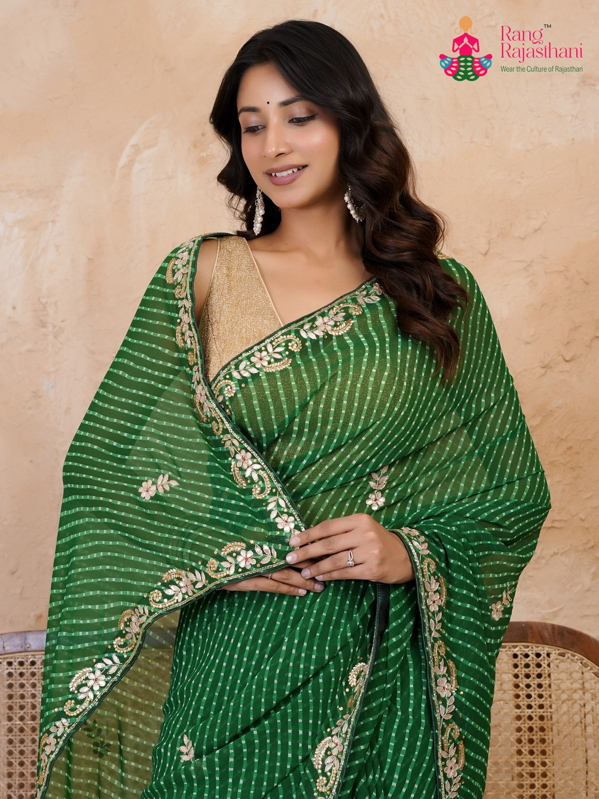design pattern of green soft georgette gota patti saree