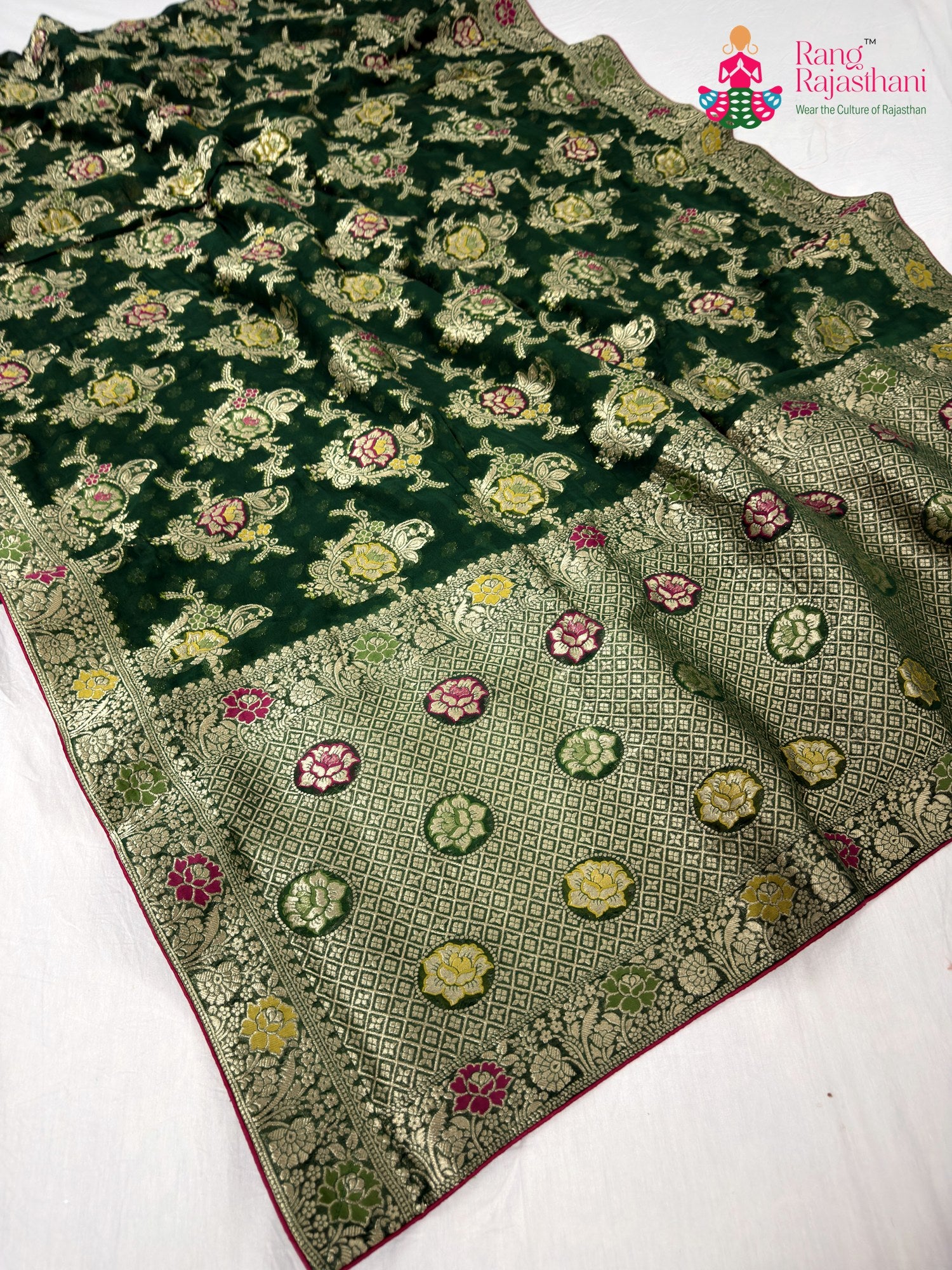 pallu detailing of green soft georgette meenakari zari saree