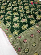 close up detailing of green soft georgette meenakari zari saree