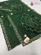 close up detailing of green synthetic bandhani saree