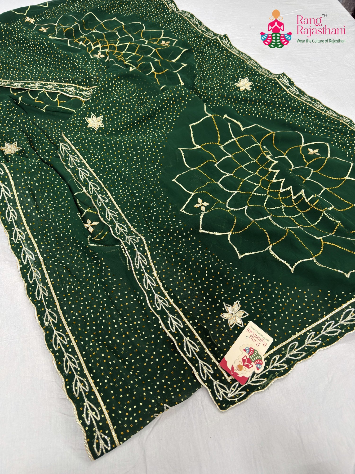 complete look of green synthetic bandhani saree
