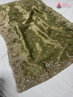 green synthetic hand embellishment saree by Rang Rajasthani